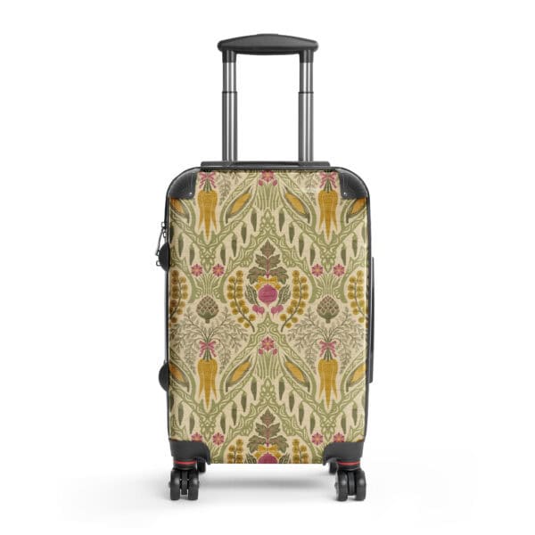 Close-up of Heirloom & Bloom floral and harvest print on hard-shell suitcase, showing wheat, gourds, and wildflowers.