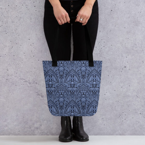 Woman holding The Grande Macabre in Twilight gothic pattern tote bag.