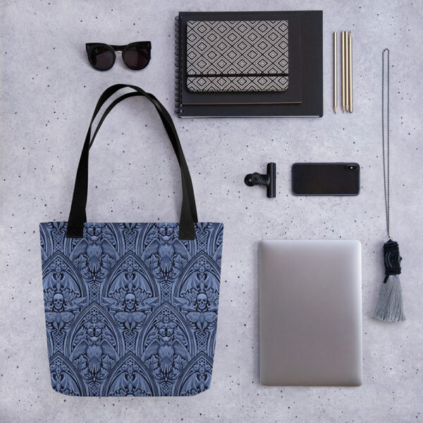 The Grande Macabre in Twilight tote bag styled with everyday essentials.