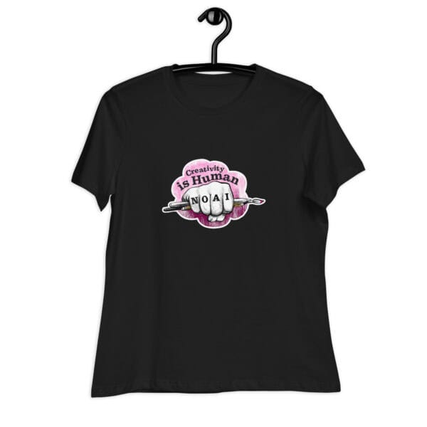 Creativity is Human No AI women's relaxed t-shirt in Black with hand-drawn fist and paintbrush graphic.