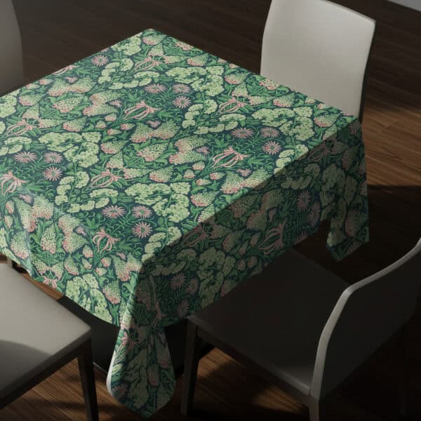 Pretty in Pinky square 58" x 58" tablecloth draped over a dining table and chairs.