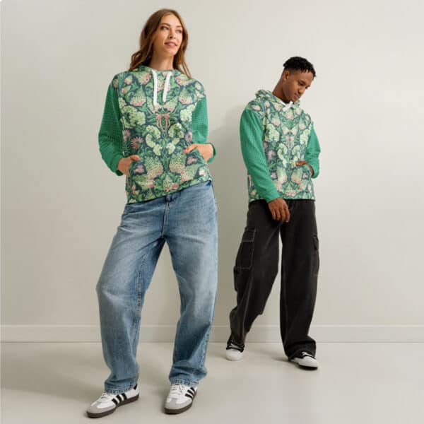 Male and female models wearing the Pretty in Pinky hoodie, with English Garden Madras sleeves.