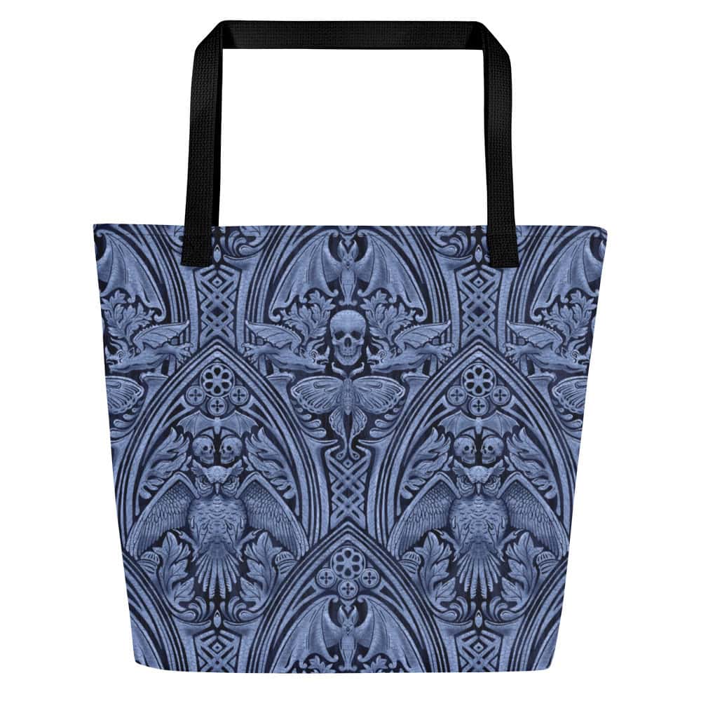 Front side of tote with black handle, featuring gothic arches and gargoyles, skulls, bats and owls, in twilight blue.