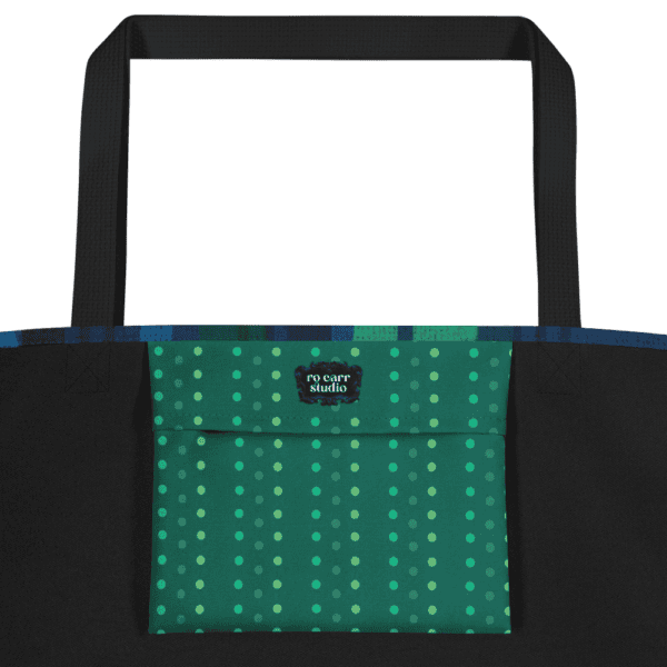 Detail shot showing interior pocket printed with companion print green dots.