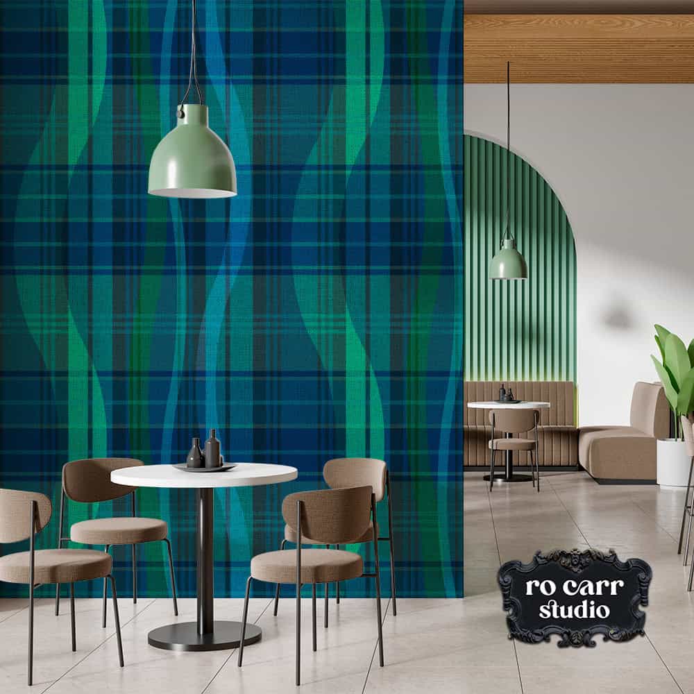 Café dining area with statement wall featuring "Breaking Plaid" print  behind seating area and pendant lighting.