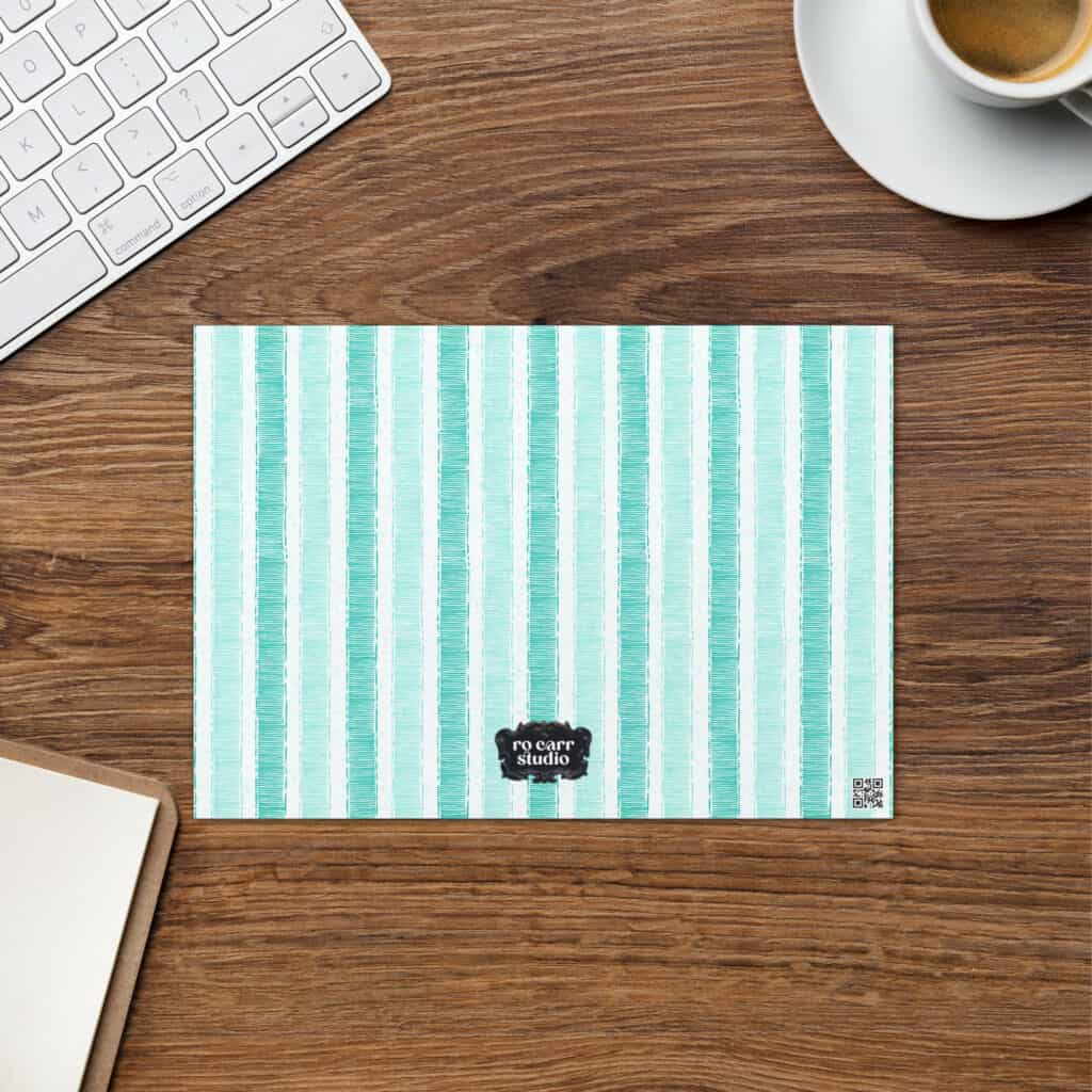Back side of card shown printed with matching grosgrain striped pattern in aqua, including Ro Carr Studio logo.