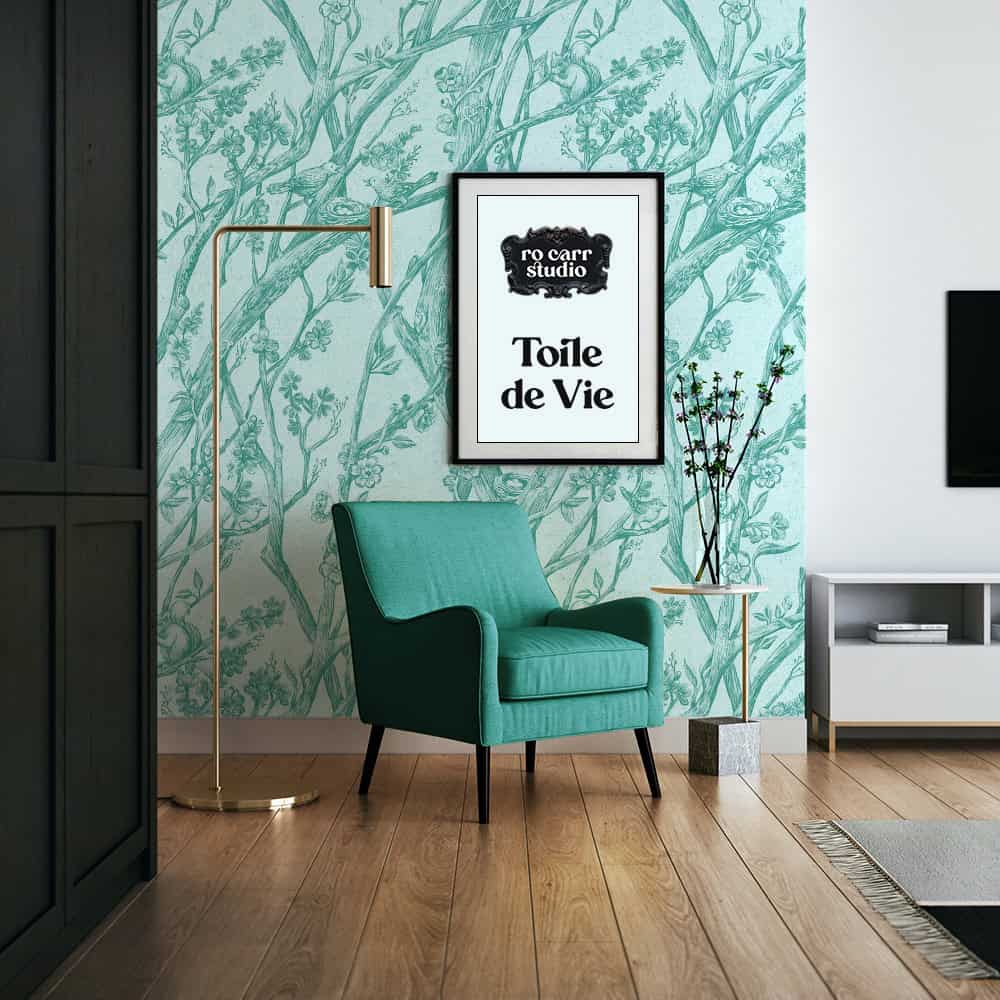 Toile de Vie wallpaper on the back wall of a modern living room, in aqua blue.