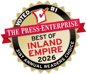 A gold and black badge proudly displays, “Voted #1 The Press-Enterprise Best of Inland Empire 2026, 31st Annual Readers Choice,” topped by a red checkmark. This honor reflects Service Champions’ trusted reputation as Southern California’s dependable local experts for HVAC, plumbing, and drain services—showcasing their unwavering dedication to delivering comfort and helpful service to the community.