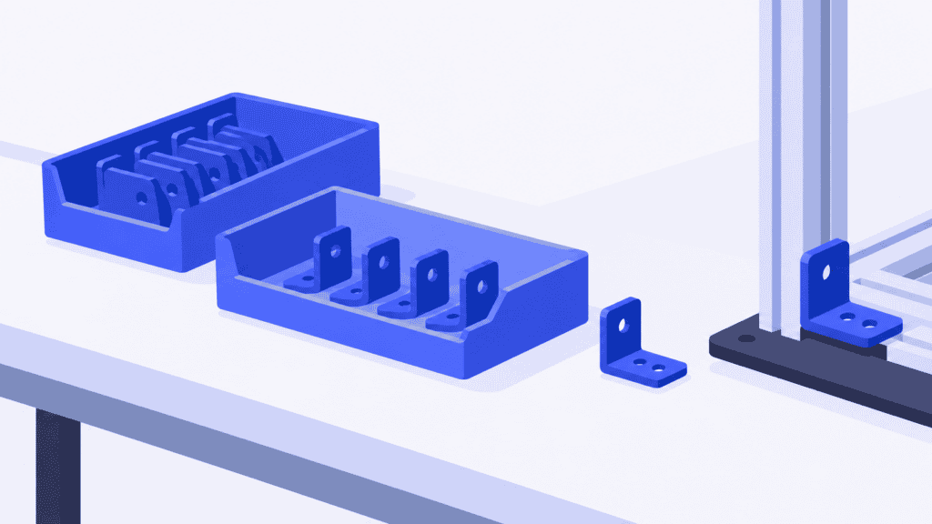 Blue mounting brackets in two bins beside a part awaiting assembly, illustrating component safety stock.