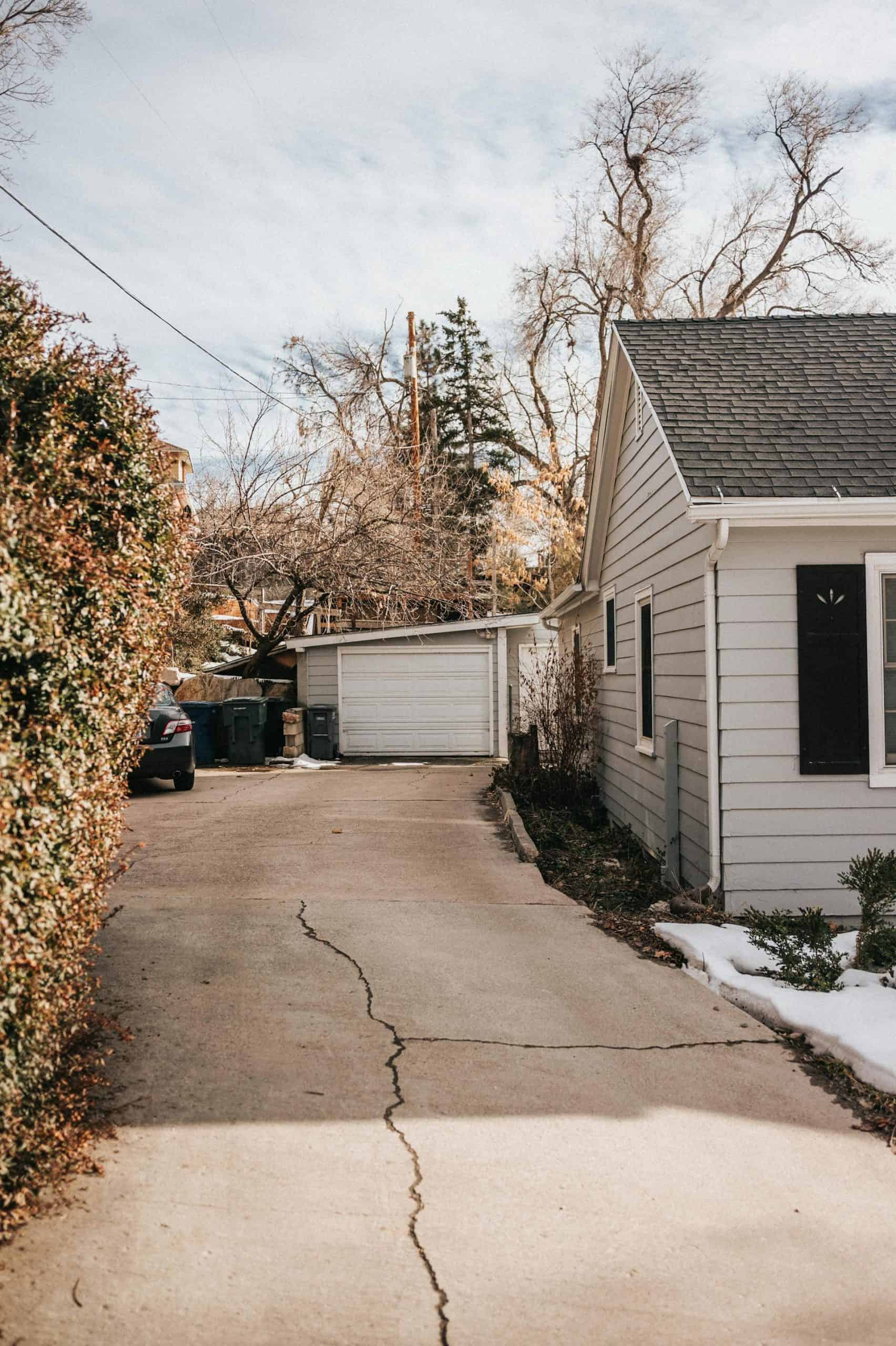 concrete driveway before crack sealing