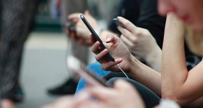 people on their cell phones
