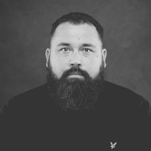 Headshot Adam Tindall