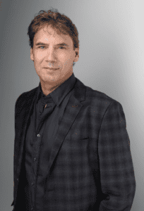Paul McKenzie, CEO at NexOptic