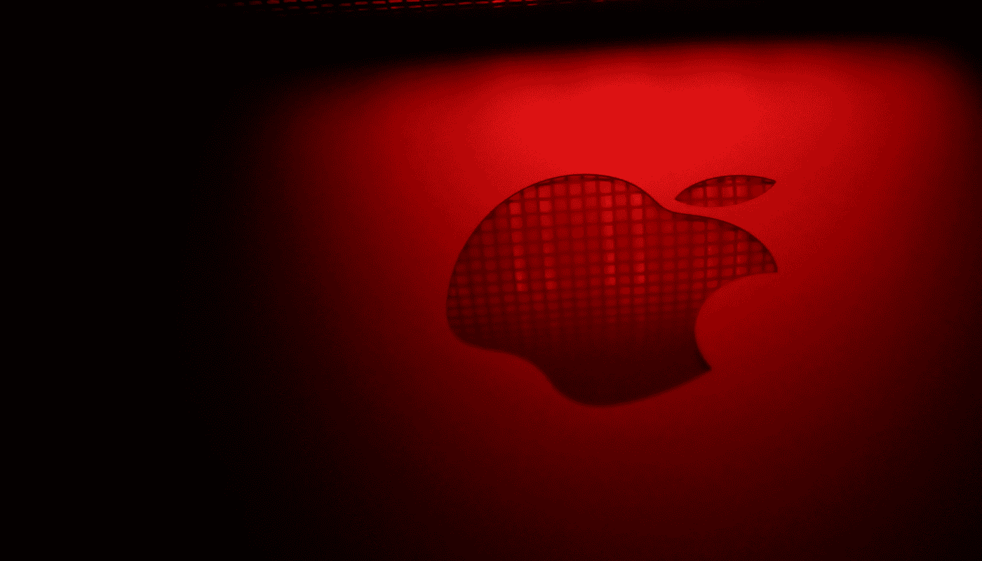 Apple logo on a device, illustrating Apple's delayed foldable iPhone and questions about the company's hardware innovation trajectory.