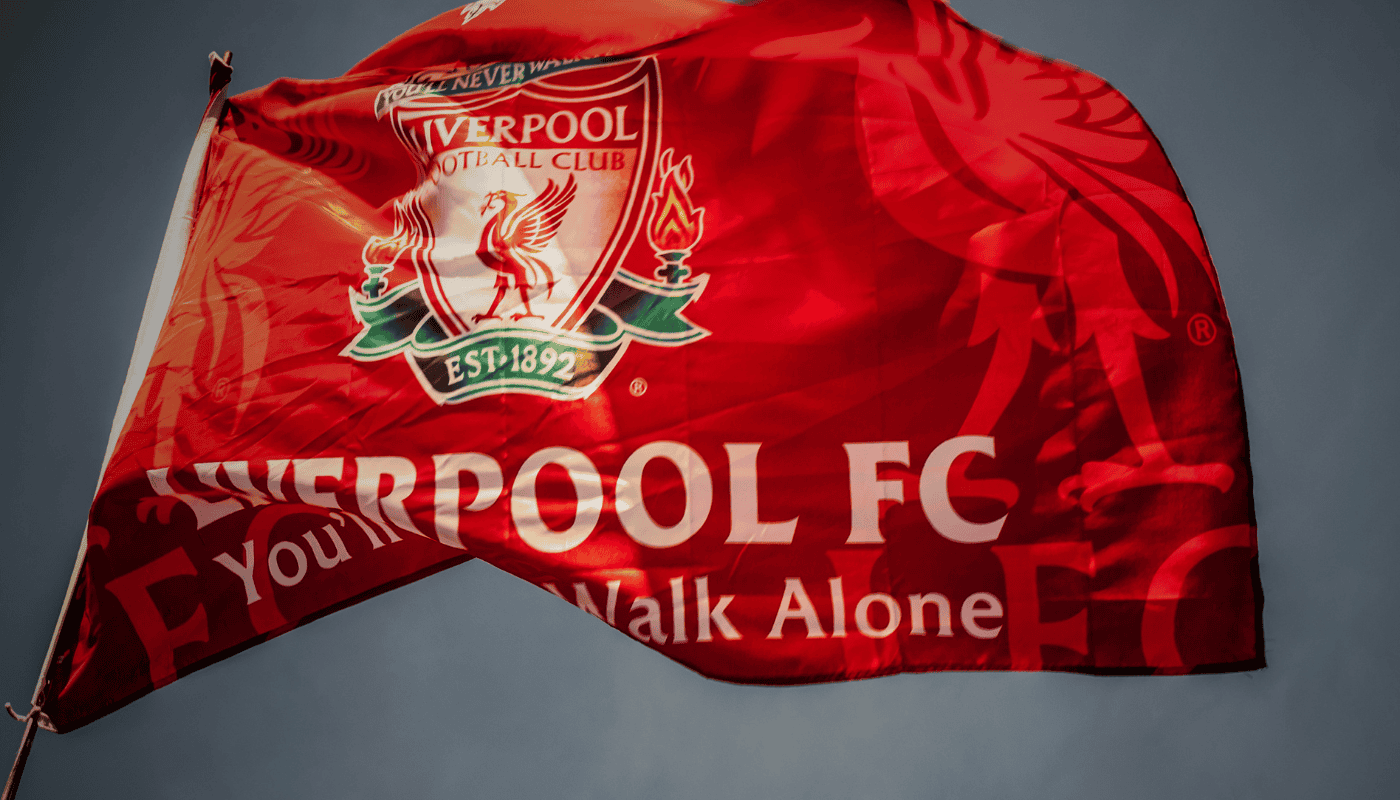 A Liverpool FC flag, the intersection of elite sports and data technology as Liverpool FC deploys AI-driven personalised fan marketing at scale with SAS.