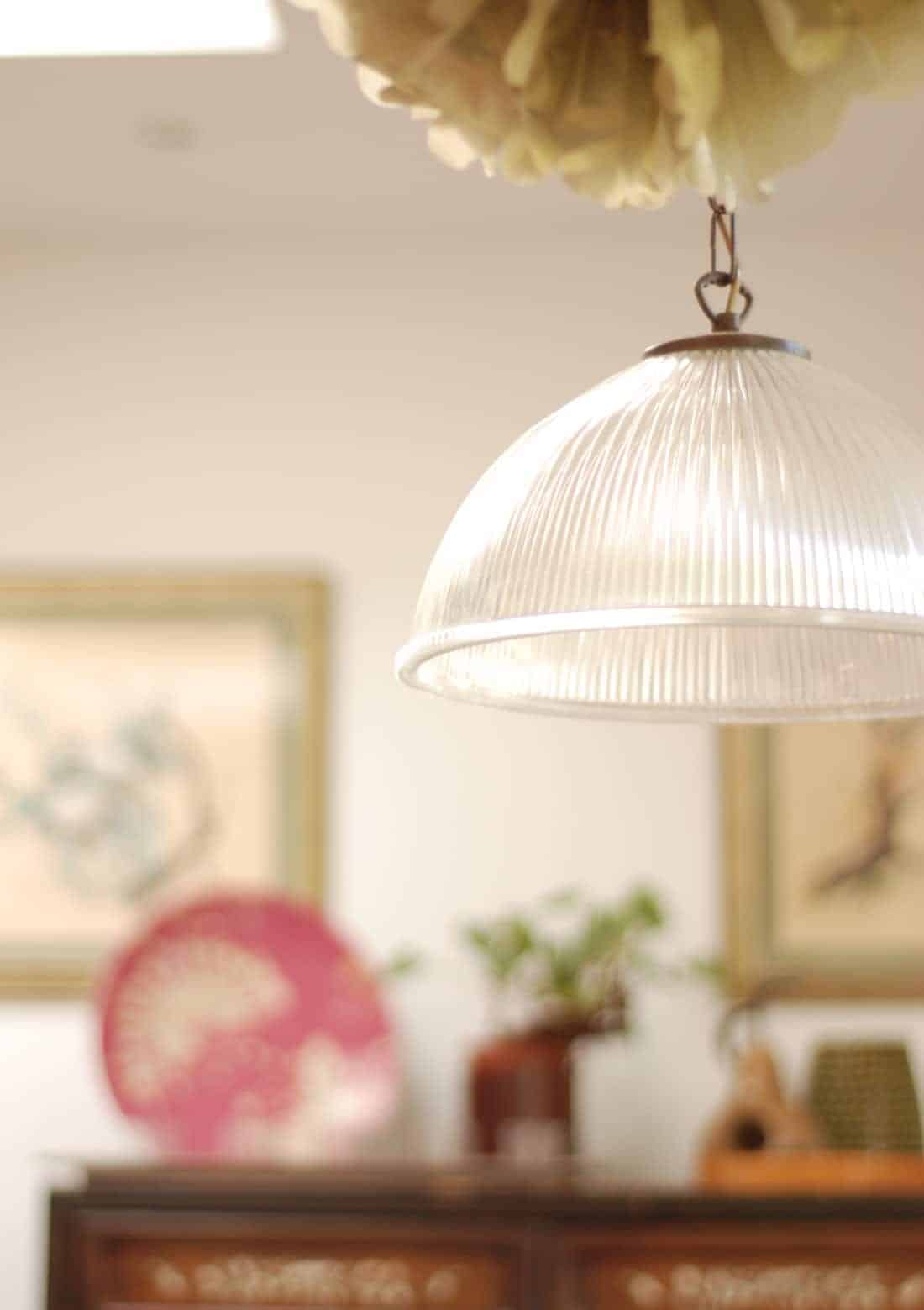 Twinkly pendant lighting in this beautiful Brighton townhouse add light to a dark space