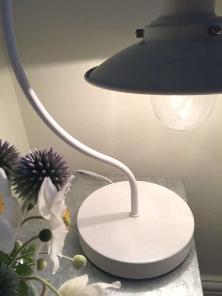 An industrial style fisherman's lamp  in a glossy white enamel.