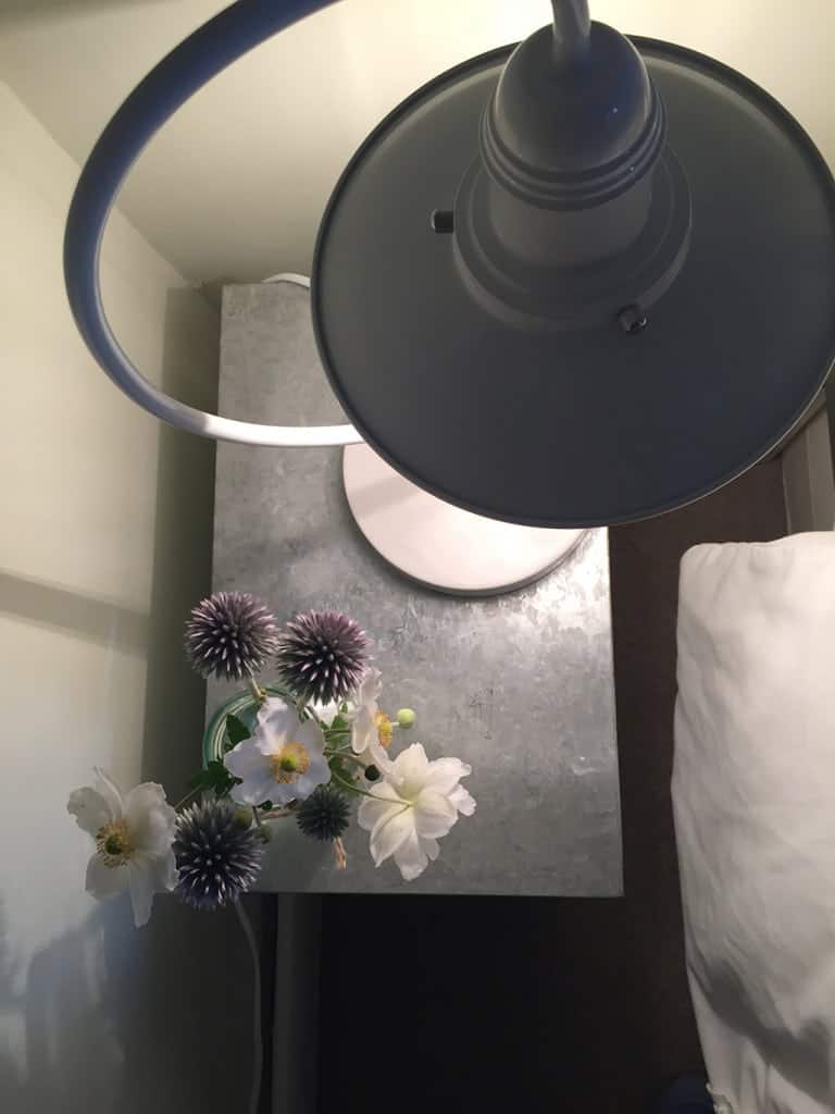 An industrial style fisherman's lamp  in a glossy white enamel.