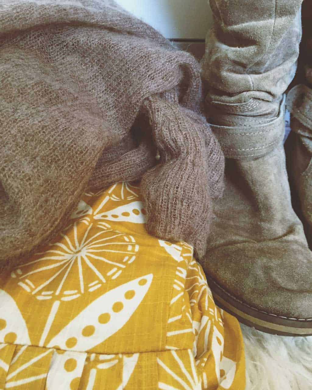Seasonal style can include summer dresses with boots and chunky knits