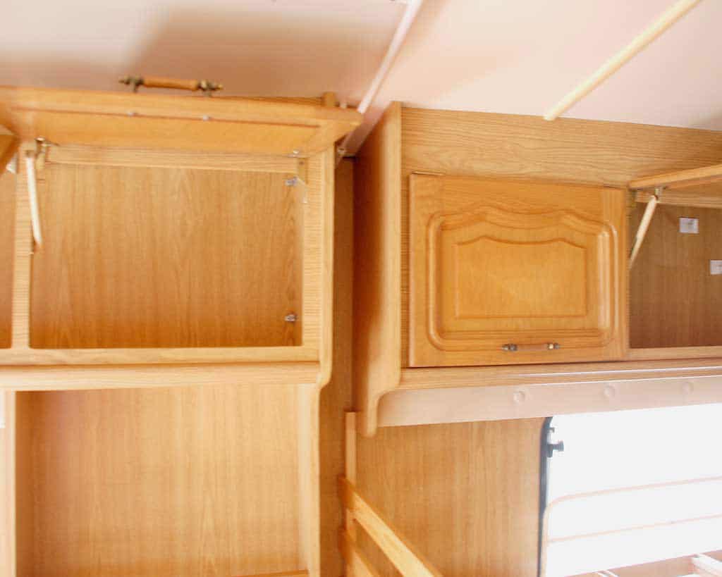 5 Tips on Buying a Second Hand Caravan — open cupboards to check for damp