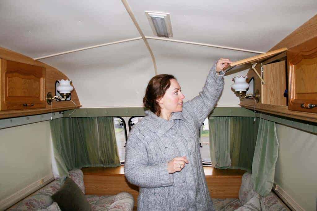 5 Tips on Buying a Second Hand Caravan — open cupboards to check for damp