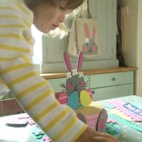 Making Easter bonnets at the kitchen table