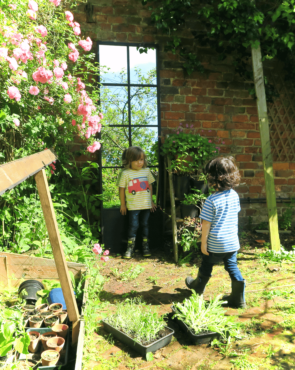 A strategically placed garden mirror will illuminate even the gloomiest corner and also give tantalising glimpses into other areas.