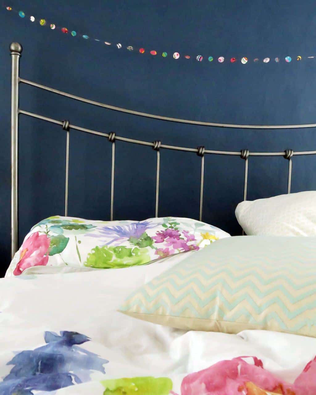 A colourful bedroom makeover " Navy walls and bright bedlinen from bluebellgray