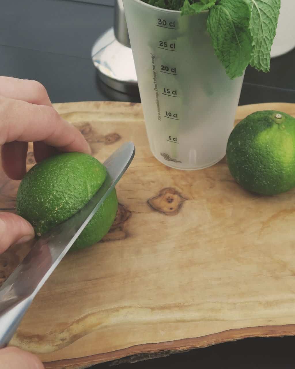 recipe to show how to make the perfect Mojito — chopping the limes