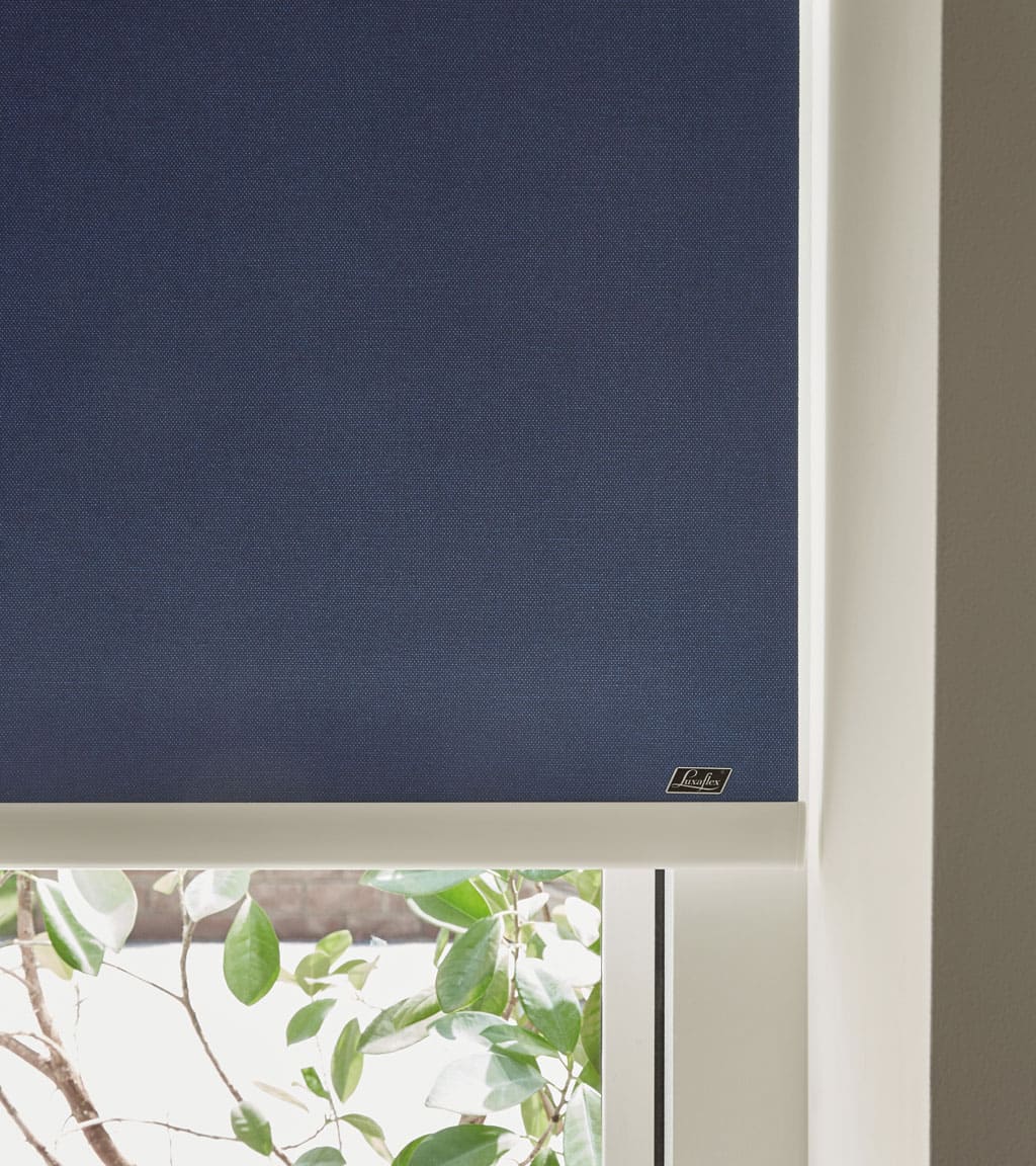 Navy roller blinds from Luxaflex