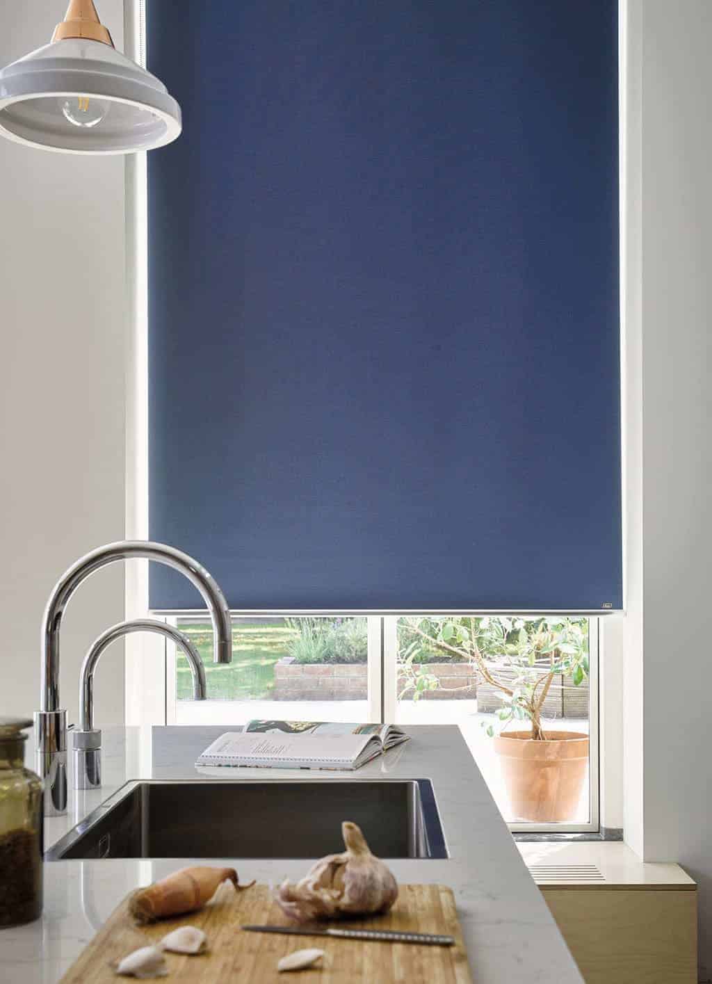 Navy roller blinds from Luxaflex