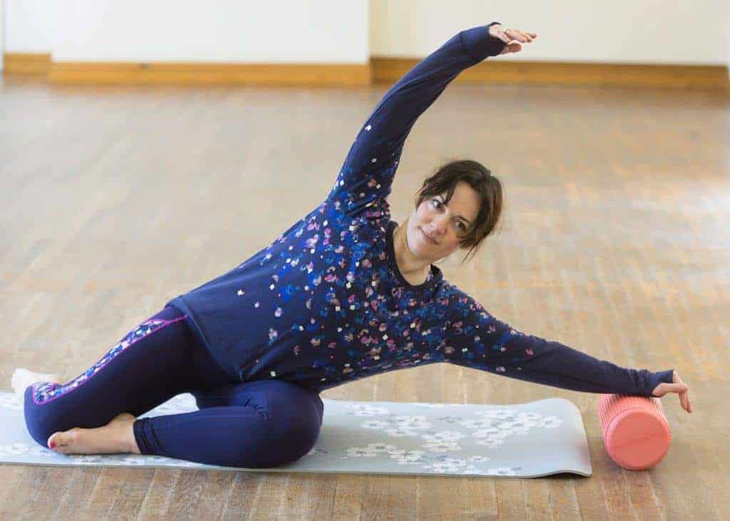 How Pilates Changed My Life | mermaid pose with short foam roller
