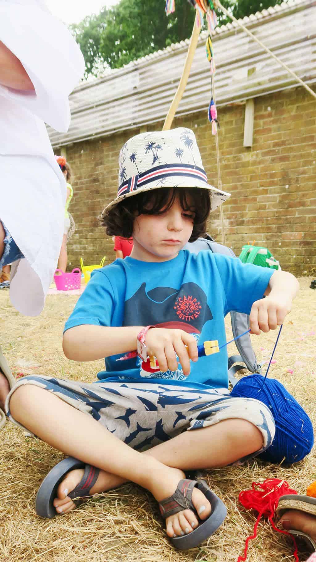 The Craft Corner at Camp Bestival 2018 where we learnt how to make pom poms 