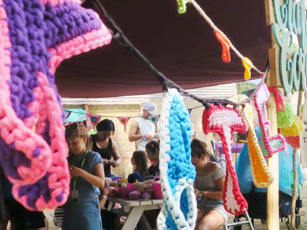 The Craft Corner at Camp Bestival 2018 where we learnt how to make pom poms