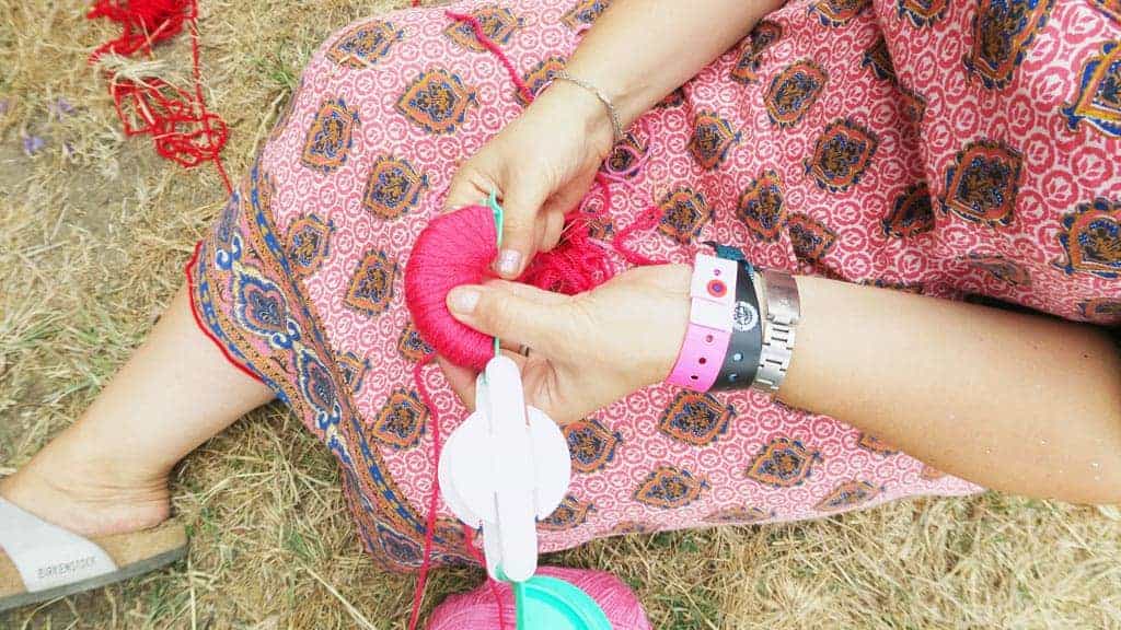 The Craft Corner at Camp Bestival 2018 where we learnt how to make pom poms
