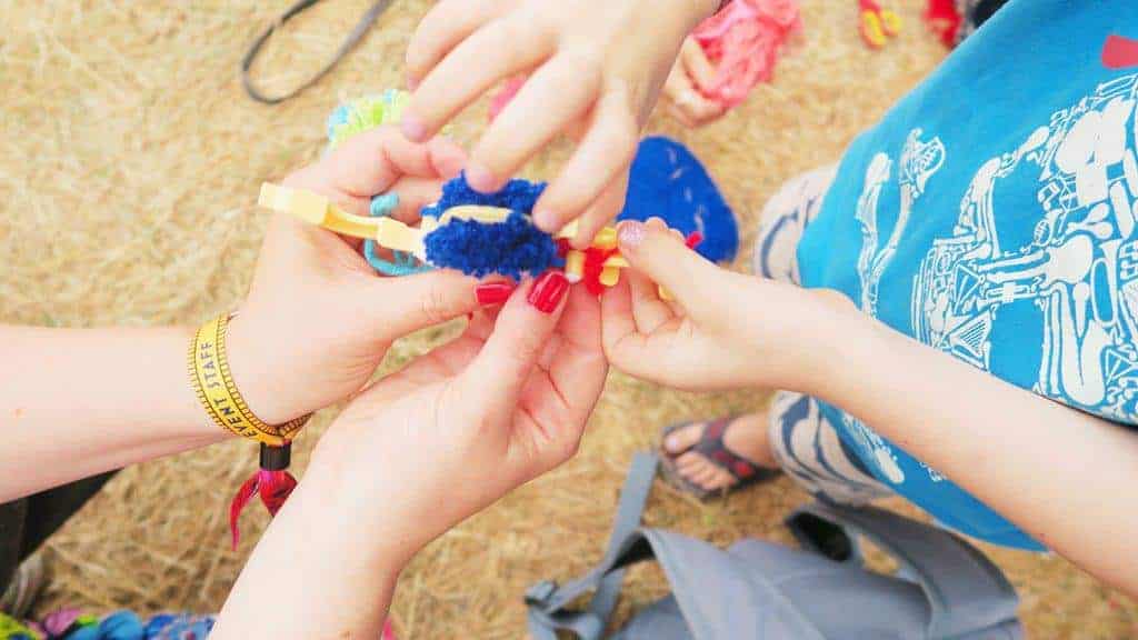 The Craft Corner at Camp Bestival 2018 where we learnt how to make pom poms