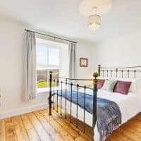 One of the bedrooms at Pendriffey cottage, Looe | Image courtesy of Cornish Horizons