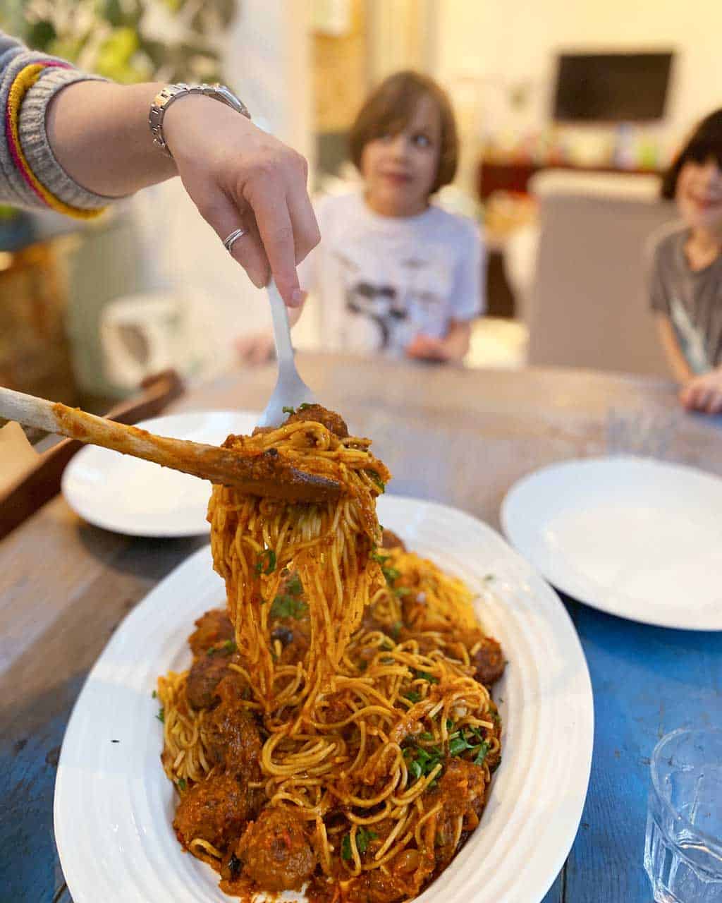 A recipe for homemade Italian Pasta Puttanesca with meatballs.