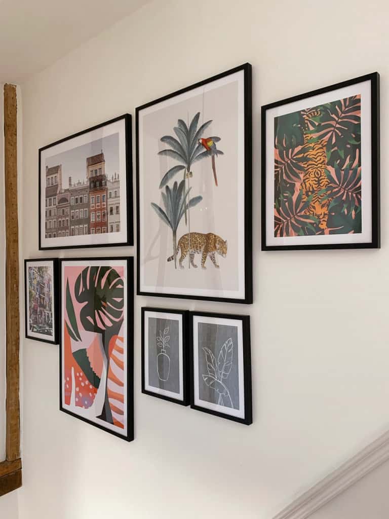 A gallery wall is just one of the 10 luxury home decor Touches that will transform your living space.