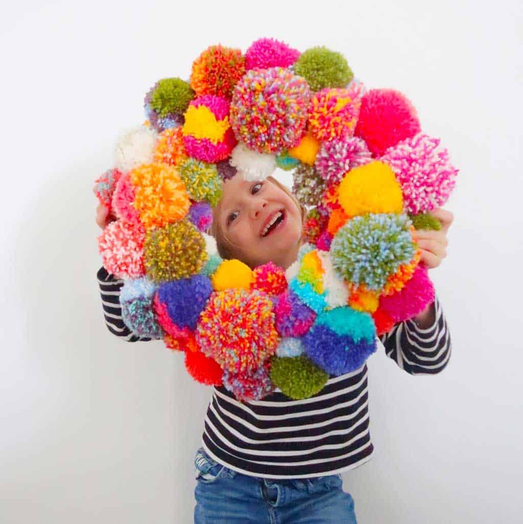 How to make an Anthropologie inspired pom pom wreath.