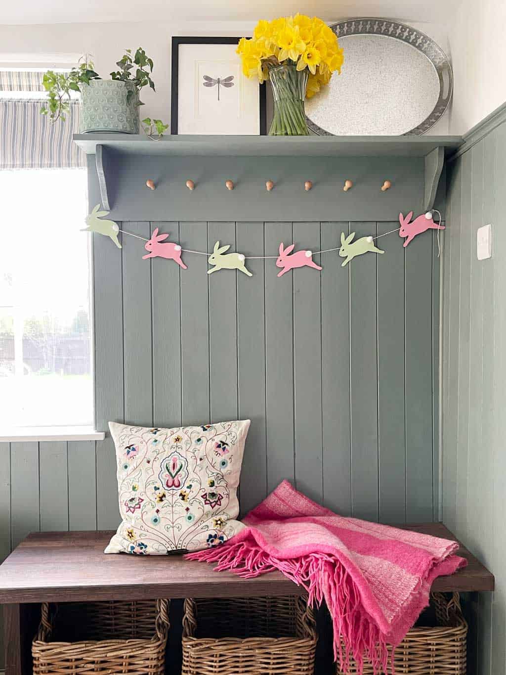 Create an easter bunny garland with craft pom poms and card.
