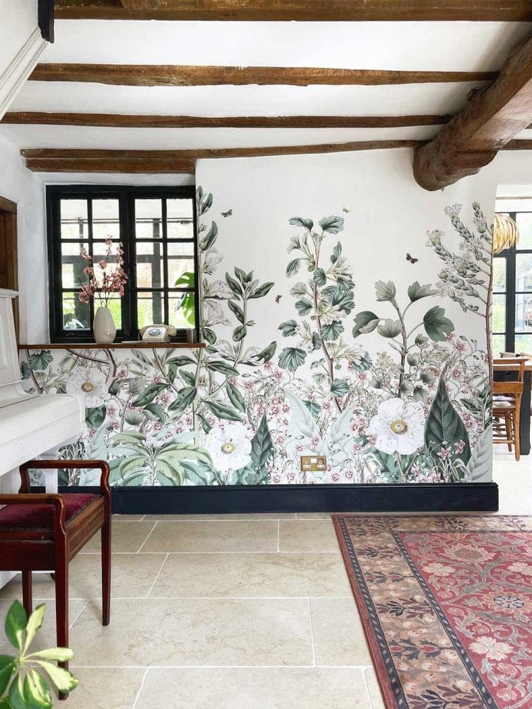 Bespoke wall mural from Les Dominotiers in the The Listed Home hallway — with Monte Carlo limestone floor from Quorn Stone