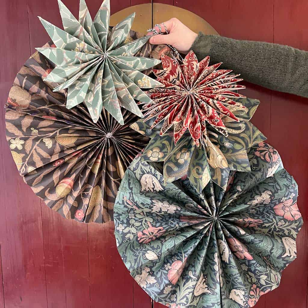 Make these DIY Paper Fan Decorations For your Christmas decor