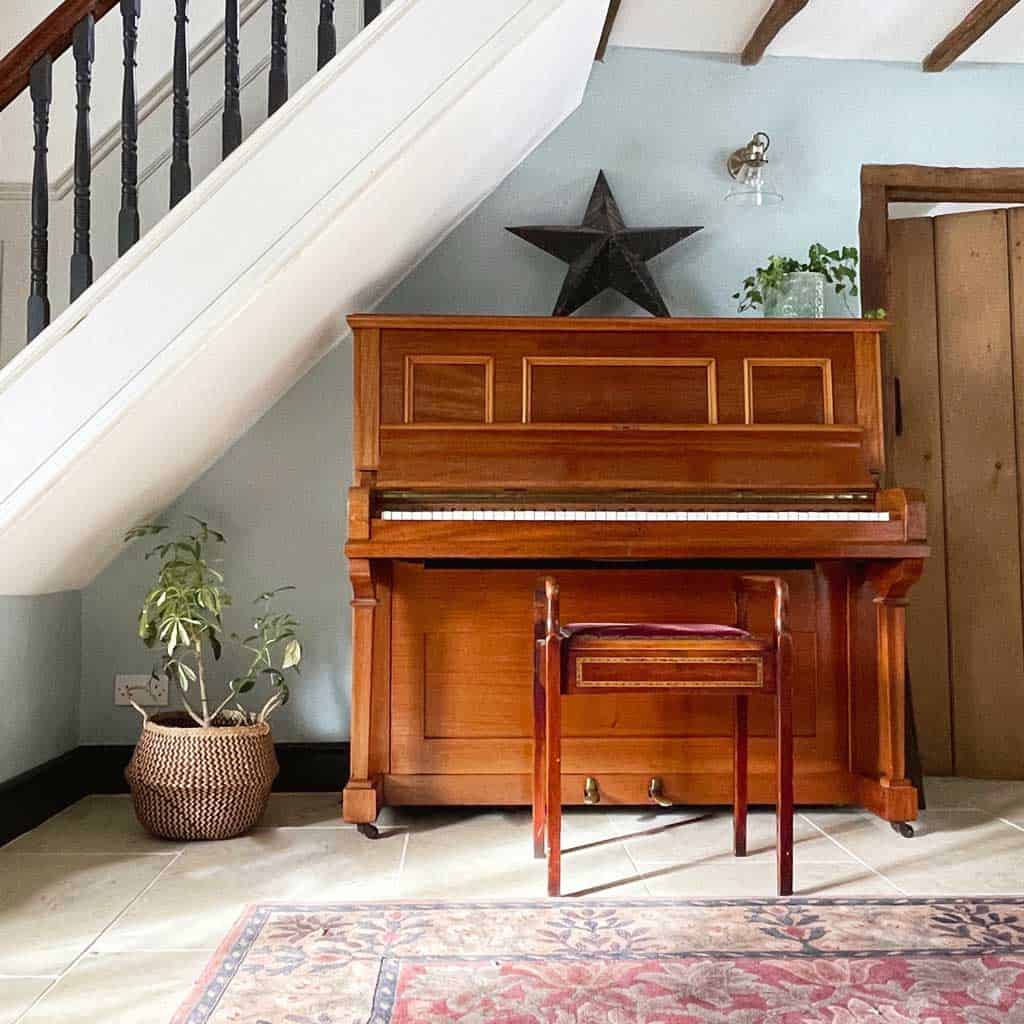 Piano before its piano makeover! See my tutorial —  'How to paint a piano in just 3 easy steps' — to see the piano once it was painted.