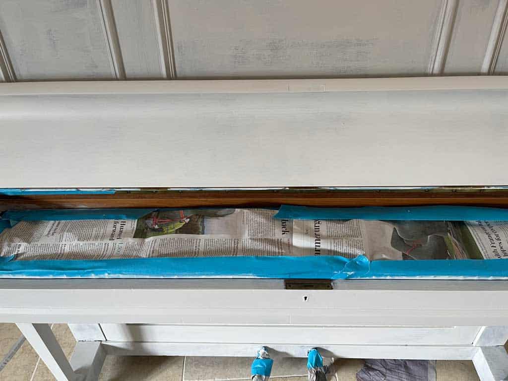How to paint a piano: Use painter's tape to thoroughly mask off the areas that you don't want to paint. 