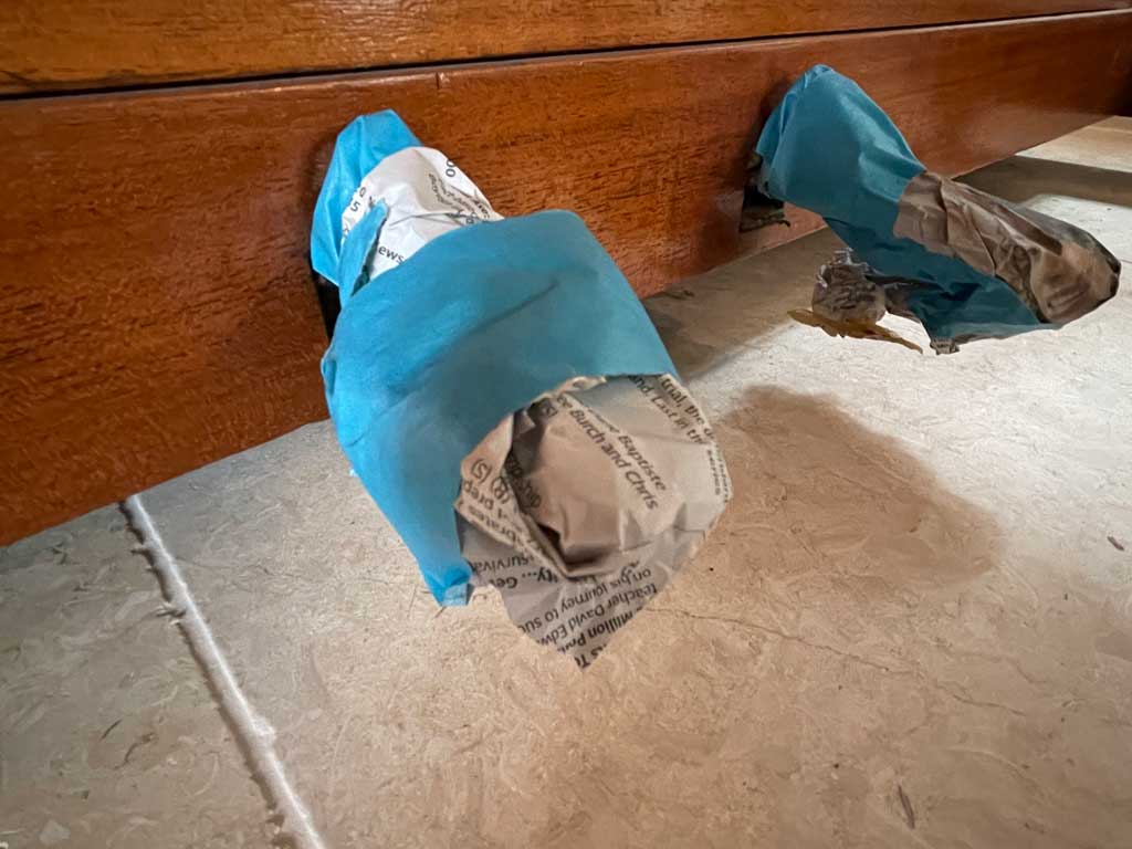 How to paint a piano: Use painter's tape to thoroughly mask off the areas that you don't want to paint. I masked the  pedals with newspaper and tape.