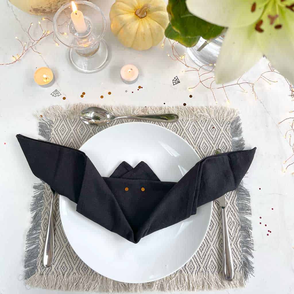 step by step bat napkin folding for Halloween