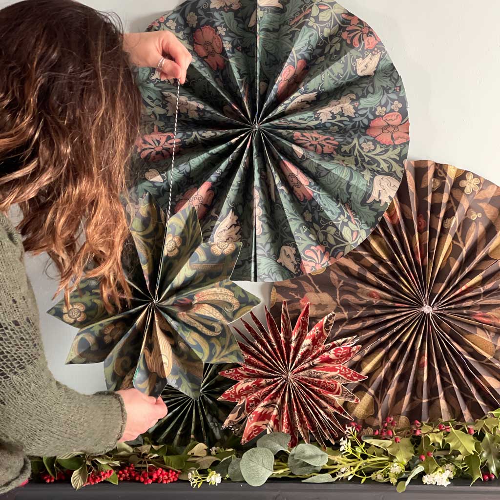 DIY Christmas crafts — paper circle fans are simple to make and look fantastic when grouped together.