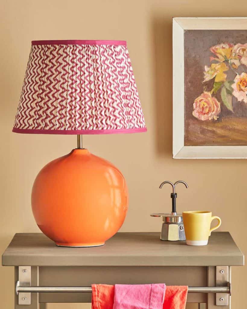 Another way to incorporate Pantone Tangerine is through accessories and decorative items. 