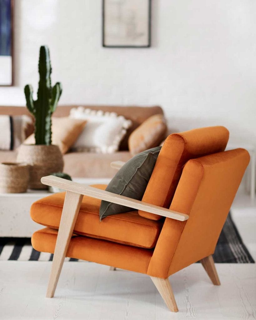 Using Pantone Tangerine in Interiors - accent chair in orange by DFS